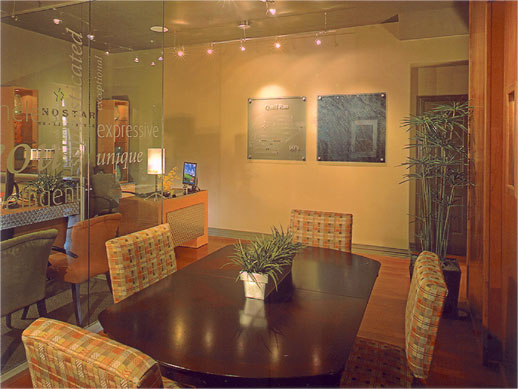 The Landstar Homes sales office with a large table surrounding by four chairs